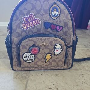 Disney Coach Tan Backpack with Disney Villan Patches